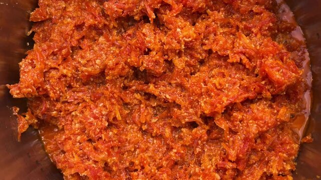 Traditional Indian Gajar Halwa (Carrot Pudding) cooking in a pot