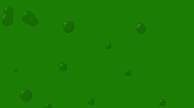 drops of water on green background