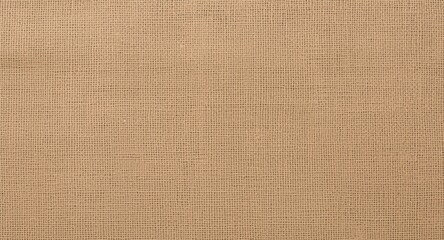 Fototapeta premium Copy space backdrop featuring a rough textured burlap in warm beige color