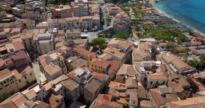 Aerial view of the historic center of Tropea, Calabria, southern Italy. It is a small town in the province of Vibo Valentia and a famous tourist destination overlooking the Mediterranean sea.