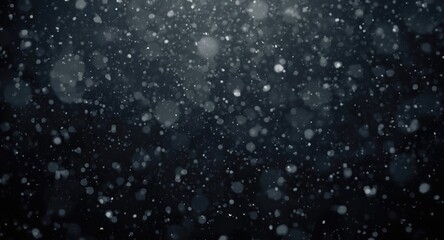 black textured background featuring heavy falling snow with copy space