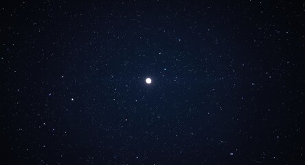 deep night sky with a shining moon and a field of twinkling stars