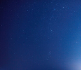 Fototapeta premium Milky way stars and constellations with a galaxy background photographed from a dark countryside location.