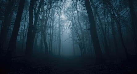 Fototapeta premium Haunted forest scene with swirling ghostlike fog at dusk