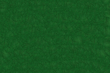 Dark green crumpled paper texture background, abstract wrinkled emerald surface, rough creased material for design