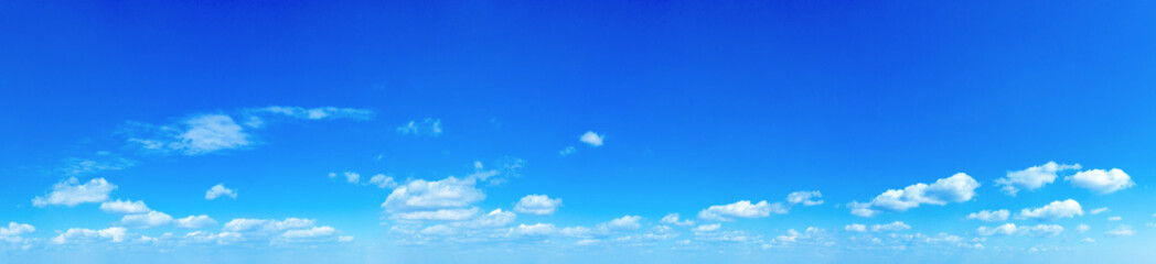Blue Sky background with tiny Clouds. Panorama background