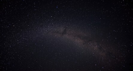 Obraz premium Background of dark space filled with shimmering stars at night
