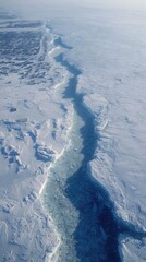 Glacial landscape shows a crack in icy terrain