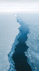 Ice crack forms in glacial landscape during winter