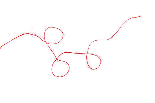 Threads on a white background. Selective focus. Isolate.