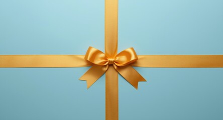 Fototapeta premium Inviting occasion greeting card with a bright golden ribbon centered on a blue background and copy space