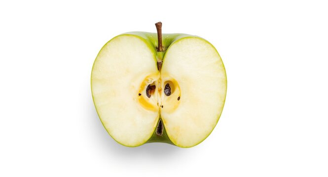 Aerial flat lay of a green apple segment revealing inner details isolated on white background with clipping path