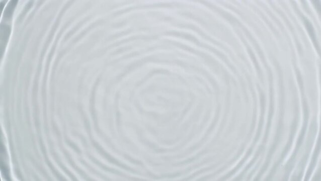Abstract background of concentric ripples on a light blue surface, creating a serene and tranquil visual effect