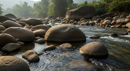 Serene river flowing through rocky landscape with lush greenery