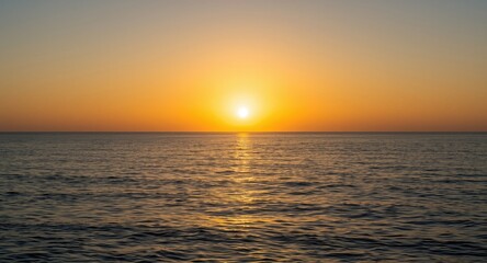Obraz premium calm ocean waters under glowing sun at horizon