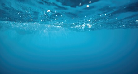 Obraz premium fresh underwater blue scene with rippling waves and drifting bubbles