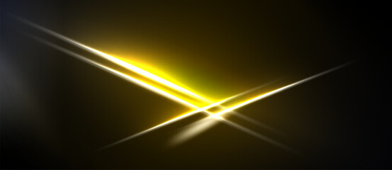 Naklejka premium Bright yellow light streaks cross dark background. Intense glow radiates from central intersection, creating dynamic visual effect.