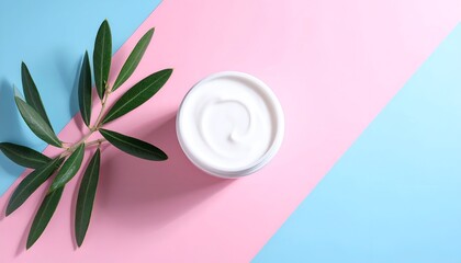 White cream and olive branch on pastel pink and blue background, angled view