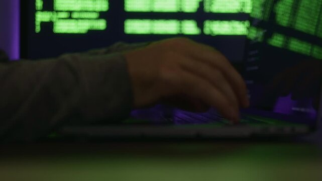 Developer working on bugs late, Late hour software engineer debugging and analyzing source code, Night shift developer concentrating intensely on troubleshooting and refining software applications