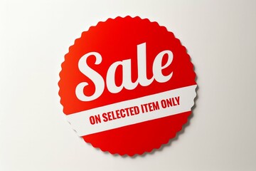 A red sale sticker with white text on a plain background.