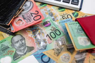 Close up of AUD Currency Cash and Calculator for Personal Finance Management and Savings Strategy