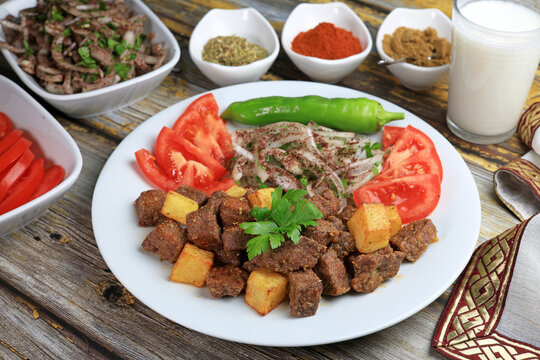 Arnavut Ciğeri, Traditional Turkish food liver with patato, onion, tomatoes and green pepper.	