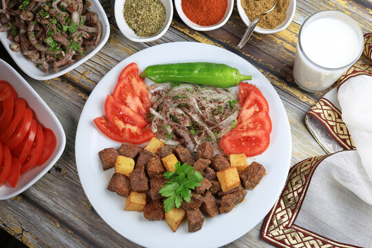 Arnavut Ciğeri, Traditional Turkish food liver with patato, onion, tomatoes and green pepper.	