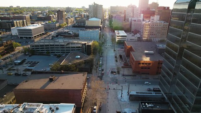 Aerial view of buildings and streets, showcasing the urban landscape and architectural diversity with a clear sky, Omaha, Nebraska, United States.