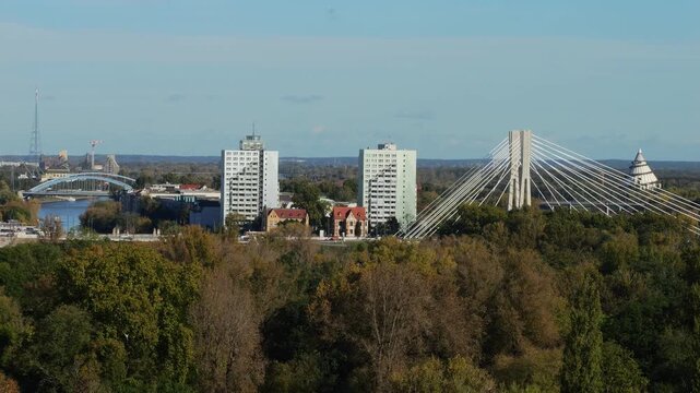 Magdeburg cityscape time-lapse with the new Kaiser-Otto-Bridge in foreground, millennium tower (right) and Magdeburg Science Harbor (left) in background