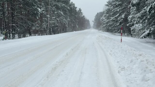 The road is covered with a lot of snow.