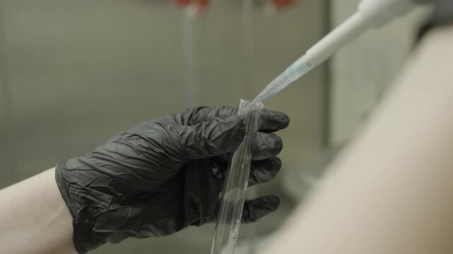Pipette with red liquid in laboratory 4k 