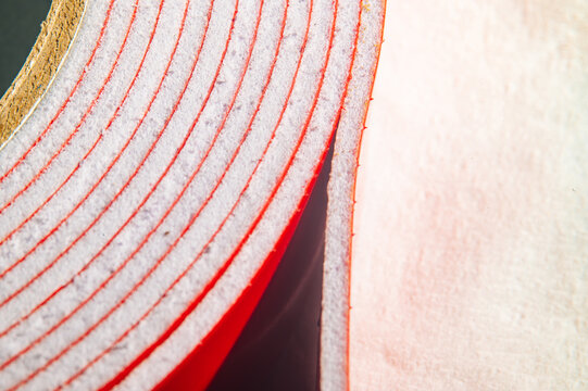 Macro Closeup Adhesive Tape Roll Spiral Edge Revealing Fibrous Crepe And Cardboard Core, Craft Bench Context
