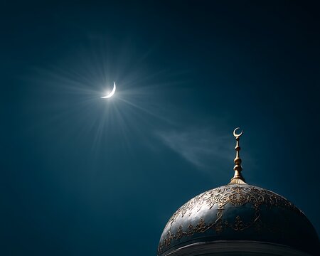 Mosque of Muslim. Crescent on copper covered dome and minaret of mosque against blue sky. Symbol of Islam and Ramadan.