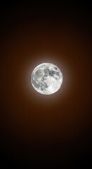 Obraz premium Detailed celestial full moon phase glowing dimly against a deep textured brown backdrop, symbolizing space, darkness, and cosmic mystery, crater, brown, cosmos