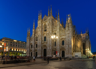 Milan Cathedral (Duomo di Milano), piazza del Duomo and Vittorio Emanuele II Gallery in Milan, Italy. Sunset cityscape of Milan. Architecture and landmarks of Milan.