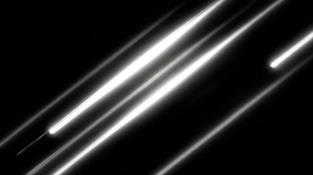 Bright, glowing white streaks against a black backdrop, forming diagonal lines. Abstract and minimalist