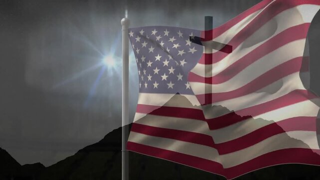 Bright flare flaring above peak spawning rain wind gusting flag billowing revealing cross outline