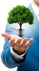 Businessman Holding Small Green Tree Growing in Light Bulb Symbolizing Green Innovation and Sustainability
