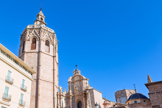 Miguelete Tower El Micalet, octagonal Gothic style bell tower of Valencia Cathedral in city of Valencia, Spain. Cathedral is known for its blend of architectural style and for housing Holy Grail relic