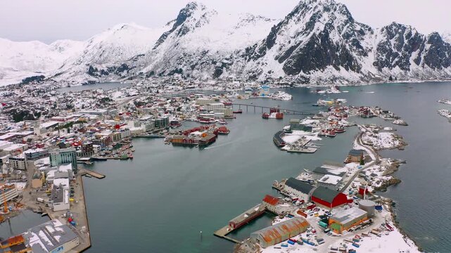 4k drone flight moving to the side footage (Ultra High Definition) of Henningsvaer town, Lofoten Islands, Norway. Splendid spring seascape of Norwegian sea. Traveling concept background.
