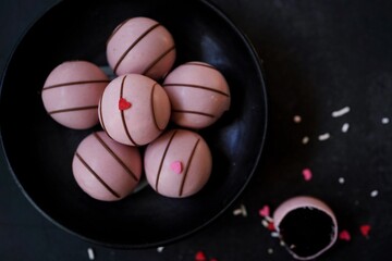 Chocolate Cake balls covered in pink icing | Valentines day sweets, selective focus