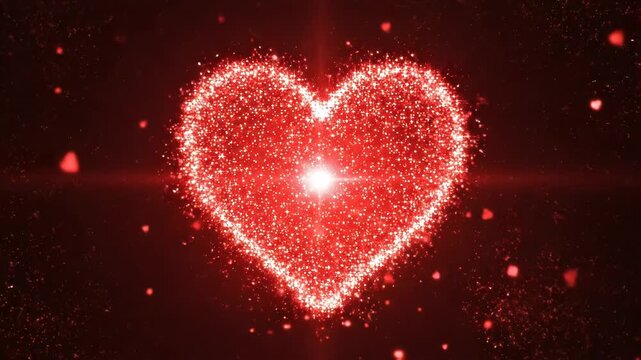 A heart made of red sparkles on a black background for valentines day or love