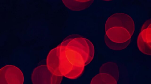 Vibrant Abstract Background with Soft Circular Lights in Red, Yellow, and Orange Hues for Creative Designs and Projects