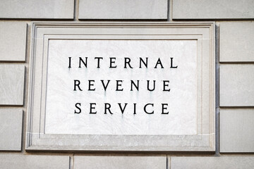 Fototapeta premium Internal Revenue Service IRS Building and Sign Representing Taxe