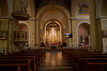 Obraz premium Catholic church interior with altar and ornate architecture