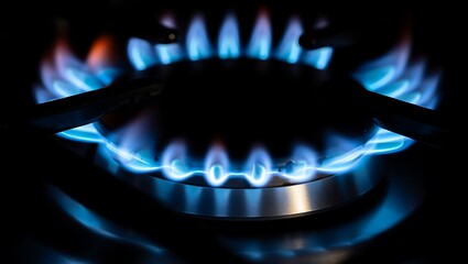 Bright blue gas stove flame ring burning intensely, symbolizing clean cooking energy, kitchen appliance technology, natural gas combustion, household heating power, efficiency, safety, and industry.