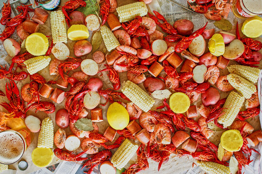 seafood boil with fresh shrimp, crawfish, potatoes, and corn