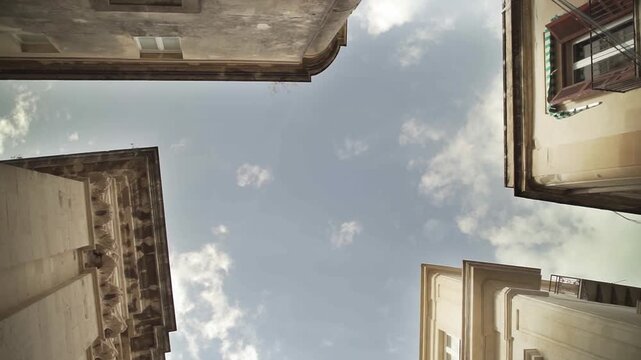 Ortygia syracuse old town buildings looking up at the sky