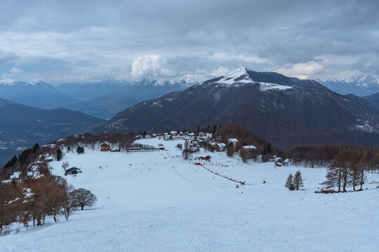 A winter view of the Valsassina seen from the "pian delle betulle", one of the most panoramic points in the area on the mountains , near the town of Casargo, Lombardy, Italy - February 2026