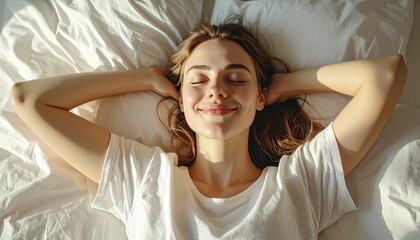 Serene woman relaxing in bed with sunlight streaming through window.